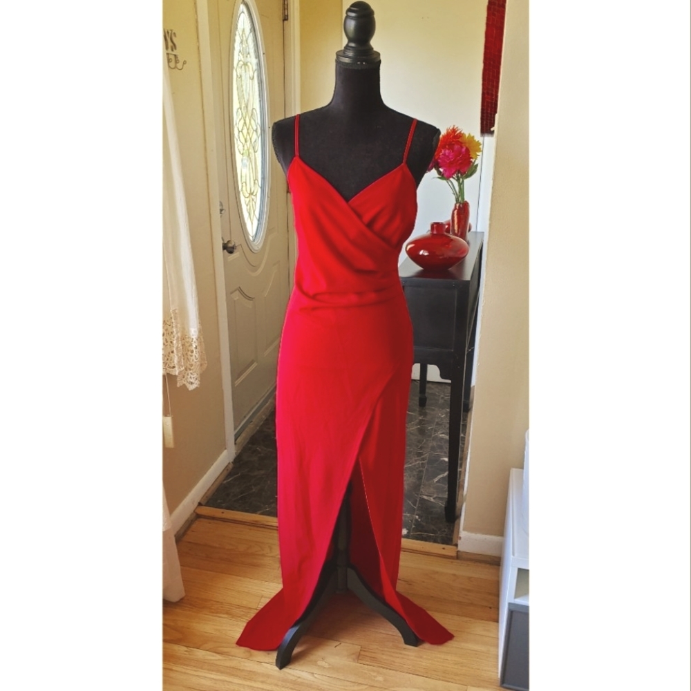 Stunning red slit dress. Perfect for weddings, homecoming, prom, etc.
